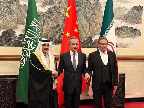 From Left: Saudi national security adviser Musaad bin Mohammad Al Aiban, Wang Yi, China's most senior diplomat and Ali Shamkhani, secretary of Iran’s Supreme National Security Council, in Beijing on March 10. Iran and Saudi Arabia then agreed to restore ties and to reopen respective diplomatic missions after talks in China.