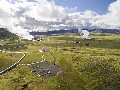 The Climeworks AG Orca direct air capture and storage facility, right, and Hellisheidi geothermal power plant, left, in Hellisheidi, Iceland.