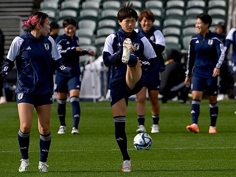Japans Jun Endo (left) and Maika Hamano attend a training session at North Harbour Stadium in Auckland on August 10, 2023, ahead of their Australia and New Zealand 2023 Women's World Cup football match against Sweden. (Photo by Saeed KHAN / AFP)