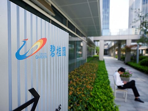 Property developer faces default after missing coupon payments