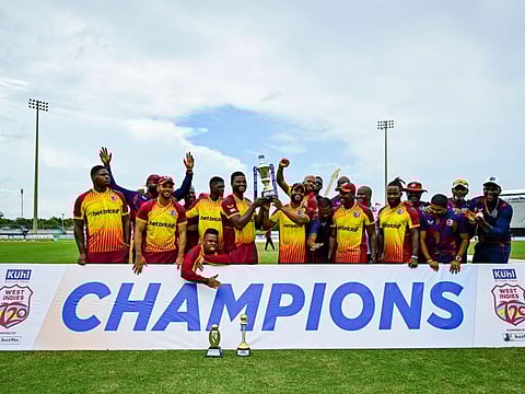 West Indies players celebrate their victory during the fifth and final T20I match against India at the Central Broward Regional Park in Lauderhill, Florida, on Sunday.