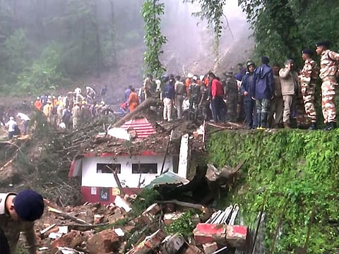 Rescue operations underway at the spot of landslide in Summer Hill area of rain-hit Shimla on Monday