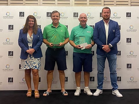 Jumeirah Pairs Winning Photo - James Finnigan and Alan McNamara (centre pair) with Evelyn Downham JGE Ladies Captain and Jonathan Hall JGE Men’s Captain