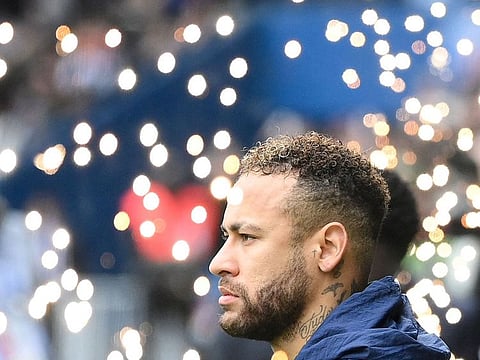Paris Saint-Germain's Brazilian forward Neymar looks on prior to the French L1 football match between Paris Saint-Germain (PSG) and Lille LOSC at The Parc des Princes Stadium in Paris on February 19, 2023. Brazil forward Neymar has signed for Saudi Arabian side Al-Hilal after six seasons with French champions Paris Saint-Germain, the two clubs announced today.