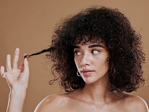 Hydration controls frizzy hair. So, regardless of your hair’s texture, shampooing is a crucial part of your hair routine