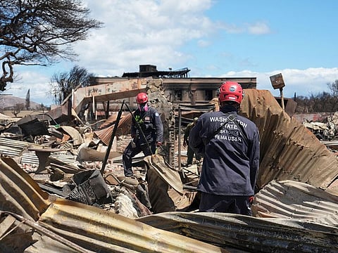 Members of FEMA Urban Search and Rescue teams Washington Task Force 1 and Nevada Task Force 1 continue searching through destroyed neighborhoods in the Maui city of Lahaina, Hawaii, U.S.