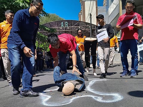 Indonesian police conducting a re-enactment of a robbery and murder amid a spate of violent crimes by 'begal' -- a specialist criminal that has gained notoriety for their brutality.