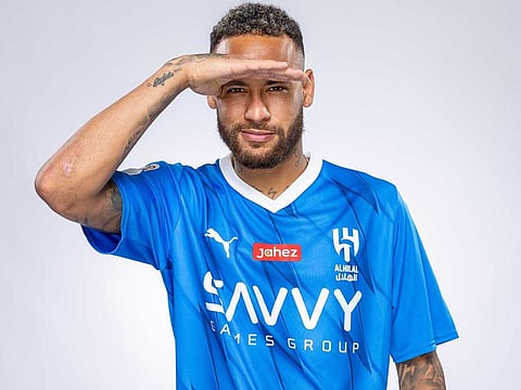 Brazilian star Neymar Jr shows off his Al Hilal shirt.