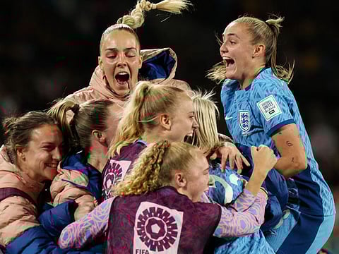 England's forward Alessia Russo celebrates with teammates after scoring a goal during the Women's World Cup semi-final against Australia at Stadium Australia in Sydney on Wednesday.
