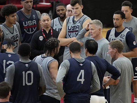 Head coach Steve Kerr of the Golden State Warriors speaks with his players at a practice during a training camp for the United States men's basketball team in Las Vegas on August 3.