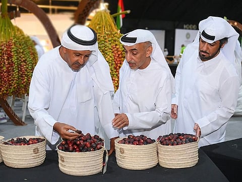 Visitors sample dates during a previous edition of the festival