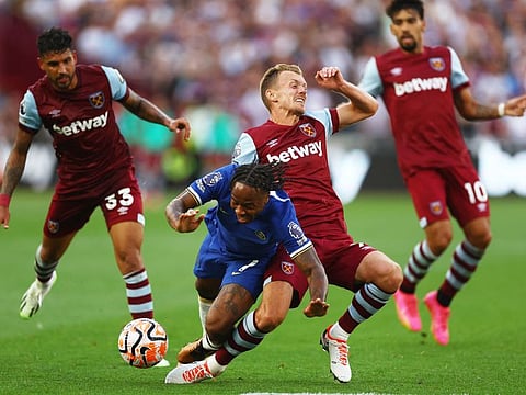 Chelsea's Raheem Sterling in action with West Ham United's James Ward-Prowse in a Premier League match at London Stadium on Sunday.