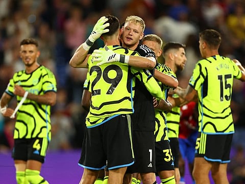 Arsenal's Oleksandr Zinchenko, Kai Havertz and Aaron Ramsdale celebrate after the Premier League win against Crystal Palace at Selhurst Park, London, on Sunday