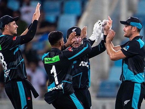 New Zealand skipper Tim Southee, Aditya Ashcok, Jim Seifert, Ben Lister celebrate after winning the third T20I against UAE at Dubai International Stadium on Sunday.