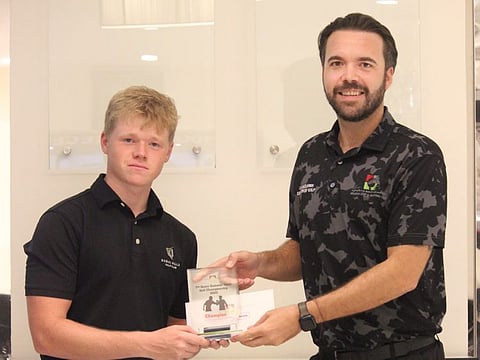 Max Hibbert (left) winner Sharjah Golf and Shooting Club Gross Summer Open with Sam McLaren SGSC Director of Golf