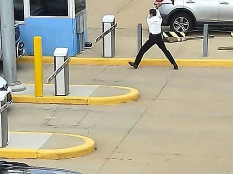 Kenneth Henderson Jones is accused of repeatedly striking the parking arm with a long-handled ax Aug. 2, knocking it off of its base and then fleeing on foot when a lot attendant confronted him.