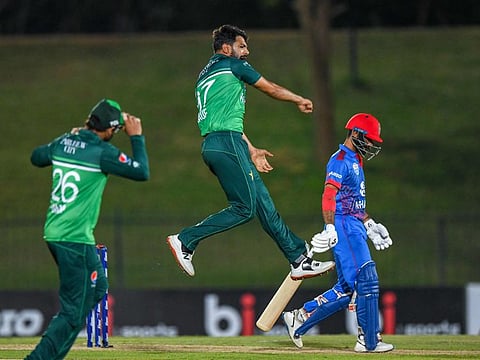 Pakistan's Haris Rauf celebrates after taking the wicket of Afghanistan's Ikram Alikhil during the first ODI at the Mahinda Rajapaksa International Cricket Stadium in Hambantota on Tuesday.