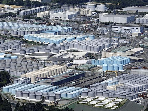 This aerial view shows the tanks containing treated radioactive wastewater at the Fukushima Daiichi nuclear power plant in Fukushima, northern Japan, on Aug. 22, 2023.