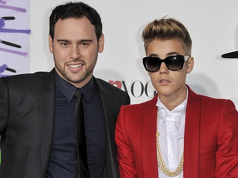 Music executive Scooter Braun with Justin Bieber.