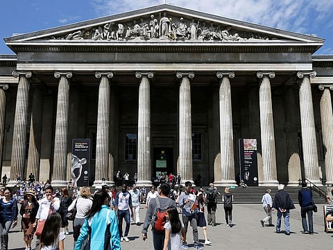 Visitors walk outside the British Museum in Bloomsbury, London.