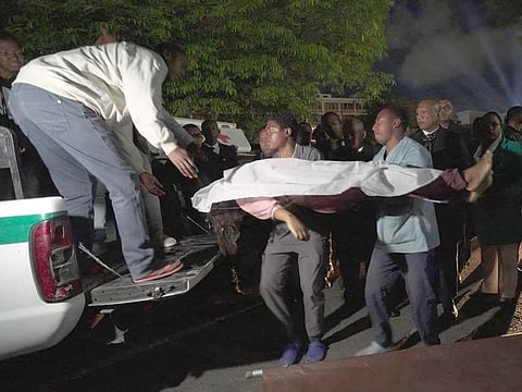 A body being brought to hospital in Antananarivo following a stampede at Barea stadium on August 25, 2023.