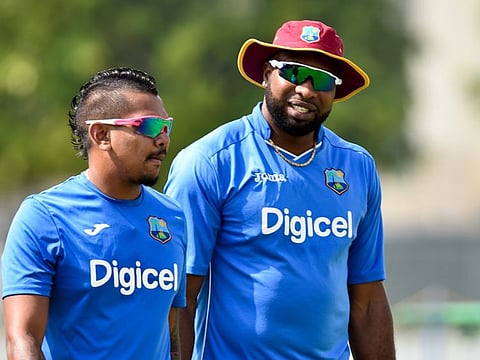 West Indian Twenty20 specialists Sunil Narine (left) and Kieron Pollard. The all-rounder becomes the first red-careded player, which has left Pollard unhappy.
