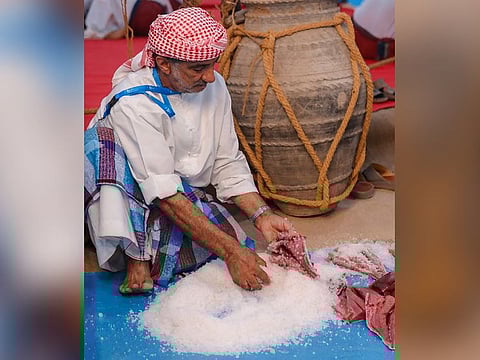 Salting fish preserves the food so it can be eaten later. The practice is part of the maritime culture of the UAE.