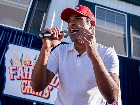 US entrepreneur and 2024 Presidential hopeful Vivek Ramaswamy raps after doing a Fair Side Chat with Governor Kim Reynolds, at the Iowa State Fair in Des Moines, Iowa.