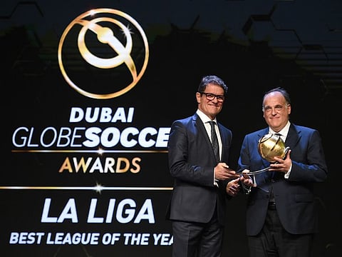 President of LaLiga Javier Tebas Medrano accepts the award for LaLiga as the 'Best League Of The Year' award at the Dubai Globe Soccer Award, presdented by Fabio Capello in 2017
