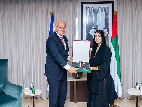Reem bint Ebrahim Al Hashimy, Minister of State for International Cooperation, presenting the UAE's First Class Medal of Independence to Jiri Slavik, Ambassador of Czech Republic to UAE during a meeting in Abu Dbabi.