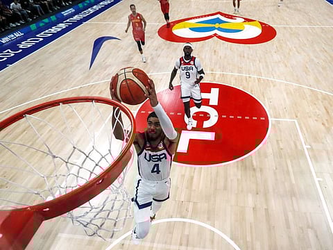 USA's Tyrese Haliburton scores during the World Cup match against Montenegro in Pasay city, suburban Manila, on Friday.