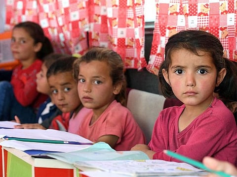 Syria's education ministry on Saturday called on schools "not to enforce strict school uniforms.