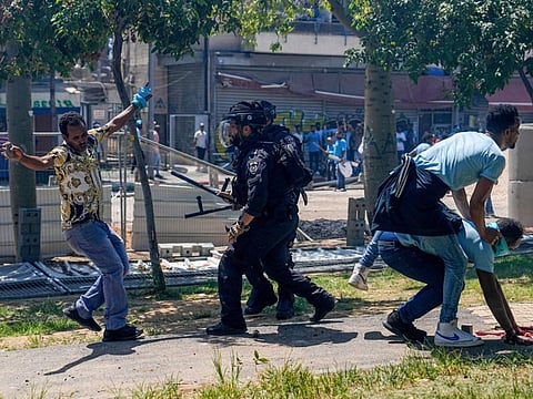Eritrean protesters clash with Israeli riot police in Tel Aviv on September 2, 2023.
