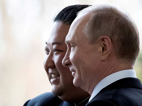 Russian President Vladimir Putin and North Korea's leader Kim Jong Un pose for a photo during their meeting in Vladivostok, Russia, April 25, 2019.