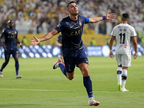 Al Nassr's Portuguese forward Cristiano Ronaldo celebrates his goal during the Saudi Pro League match against Al Shabab in Riyadh's Al Awal Park Stadium last month.