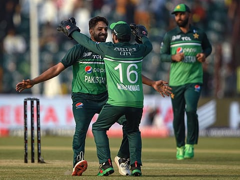 Pakistan's Haris Rauf (left) celebrates with teammate after taking the wicket of Bangladesh's Taskin Ahmed during the Asia Cup 2023 ODI match at the Gaddafi Stadium in Lahore on Wednesday.