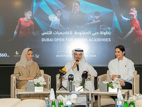 Saeed Hareb flanked by Sania Mirza (right) and Alia Bujsem, member of the Board of Directors of UAE Tennis Federation during the announcement in Dubai on Wednesday.