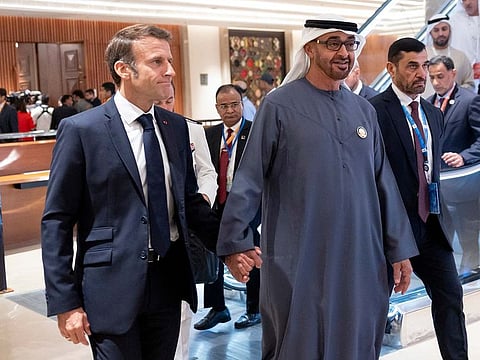 President His Highness Sheikh Mohamed bin Zayed Al Nahyan with France's President Emmanuel Macron during the G20 Leaders' Summit in New Delhi on September 9, 2023.