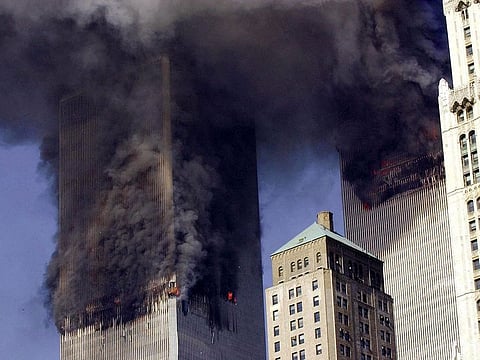 In this file photo smoke billows from the twin towers of the World Trade Center in lower Manhattan, New York on September 11, 2001.