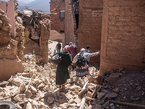 Residents flee their homes after an earthquake in Moulay Brahim village, near the epi centre of the earthquake, outside Marrakech, Morocco.