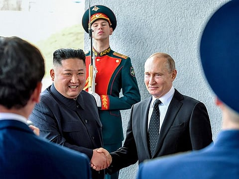 Russian President Vladimir Putin, right, and North Korea's leader Kim Jong Un shake hands during their meeting in Vladivostok, Russia, on April 25, 2019.