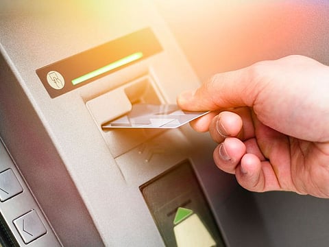 The UAE Central Bank's UAESWITCH system allows individuals of different banks to use any ATM. Picture used for illustrative purposes.