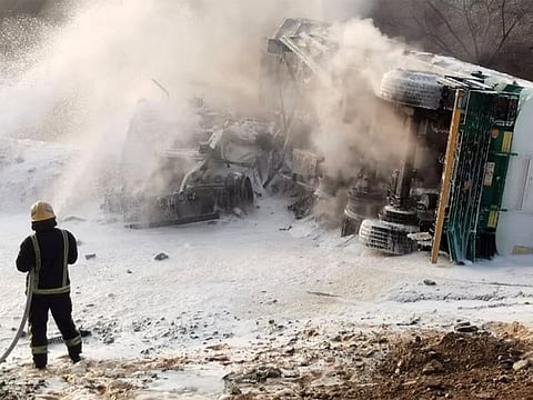 Civil defence personnel also retrieved the truck driver trapped in the vehicle unharmed.