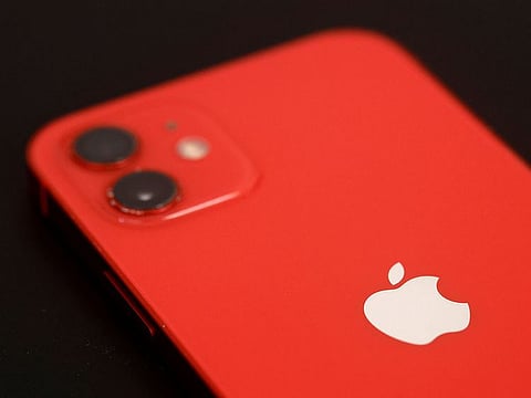 An Apple iPhone 12 is pictured in a mobile phone store in Nantes, France.