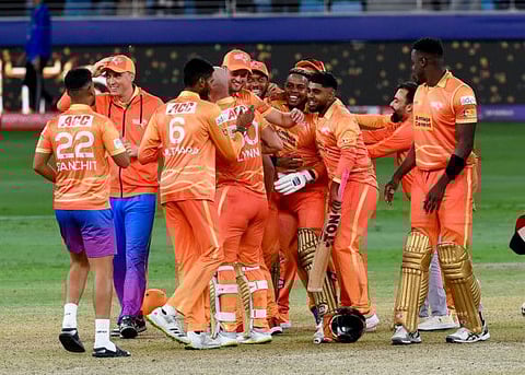 Gulf Giants players celebrate their win over Desert Vipers in the final of DP World ILT20 in the first edition.