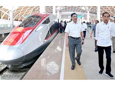 Indonesian President Joko Widodo, right, checks out the country's new high-speed train on Sept. 13.
