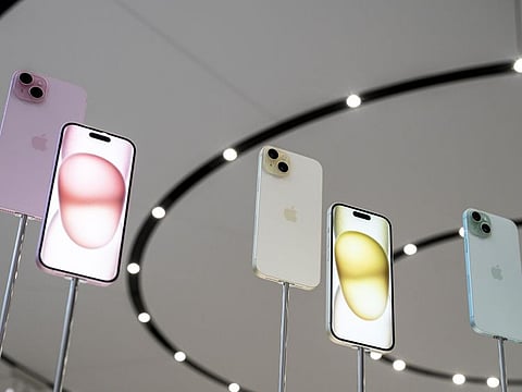 Apple introduced its latest iPhones at an event Tuesday, banking on new materials, camera upgrades and improved performance to coax back consumers in a sluggish smartphone market.