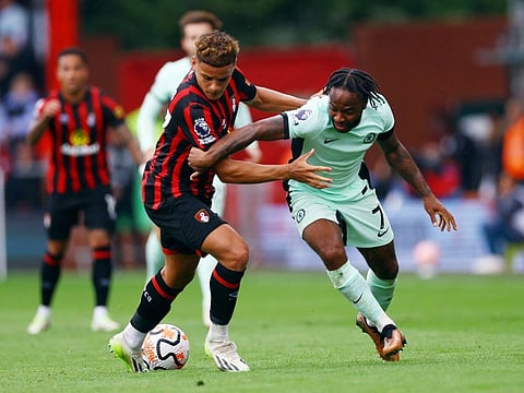 Bournemouth's Max Aarons battles for the ball with Chelsea's Raheem Sterling during a Premier League match at Vitality Stadium, Bournemouth, on Sunday.