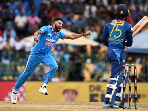 India's Mohammed Siraj celebrates the wicket of Sri Lanka's Dhananjaya de Silva during the Asia Cup 2023 final at the R. Premadasa Stadium in Colombo on Sunday.