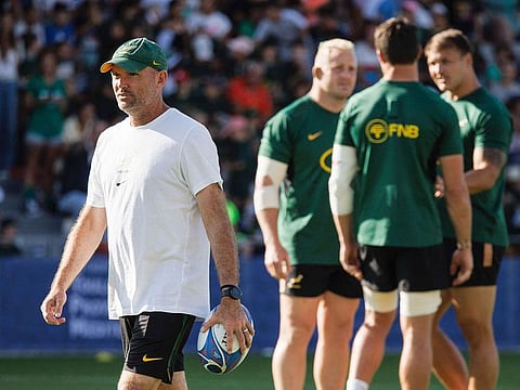 South Africa's head coach Jacques Nienaber (centre left) joins team memebers in a training session.